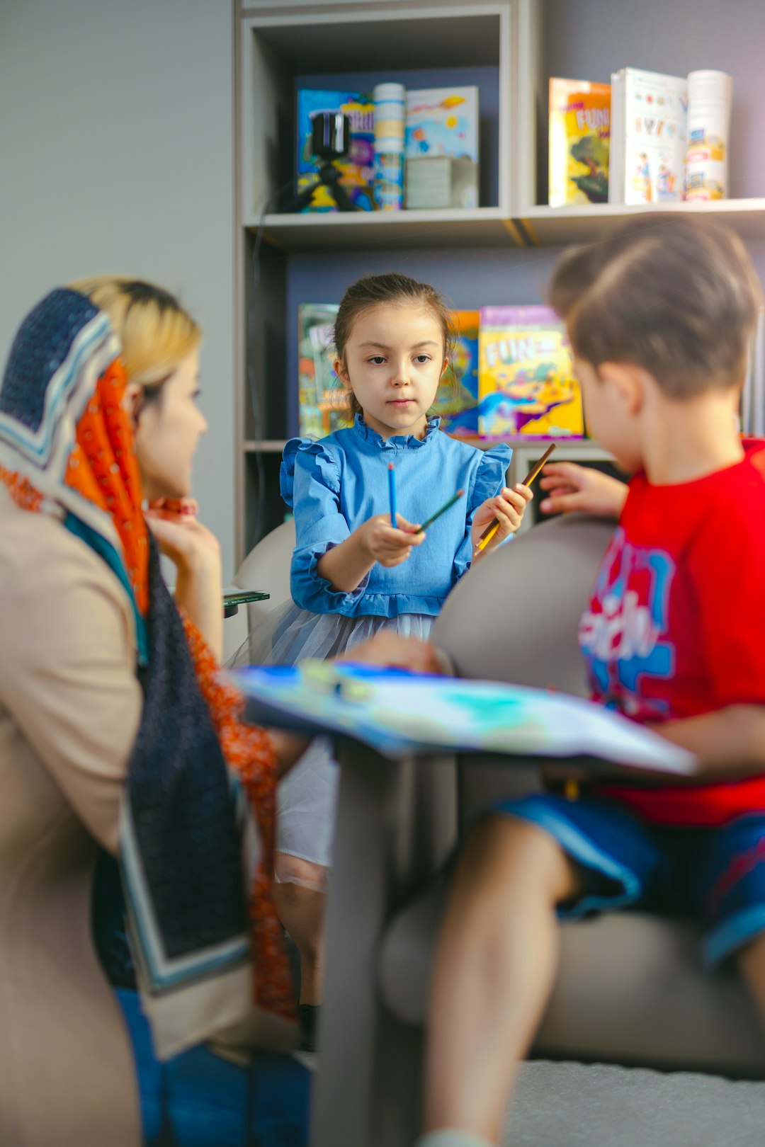 children-learning-with-a-teacher-in-a-classroom-bibc-jsnvow